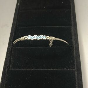 Luca & Danni Women’s Blue Stone with a Snowman Charm